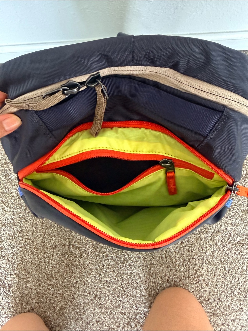 cotopaxi Black Sling Backpack with Blue Piping and Red Zip Pull - Picture 6 of 10